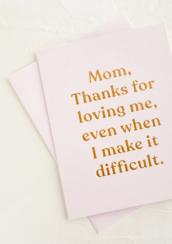 1: A greeting card that reads "Mom, thanks for loving me, even when I make things difficult".