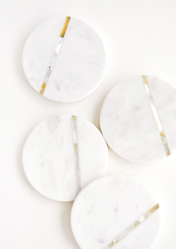 Round White Marble Coasters with Abalone Shell Inlay.