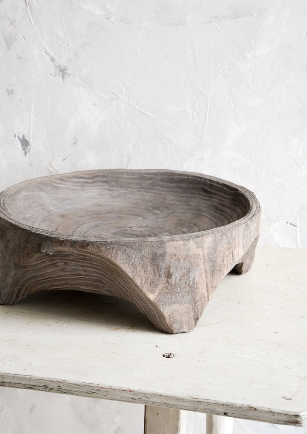 2: Round, primitive style shallow wooden display bowl with chunky footed base