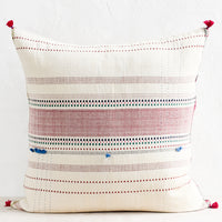 1: A cotton throw pillow with multicolor and red embroidery and tassel detailing.
