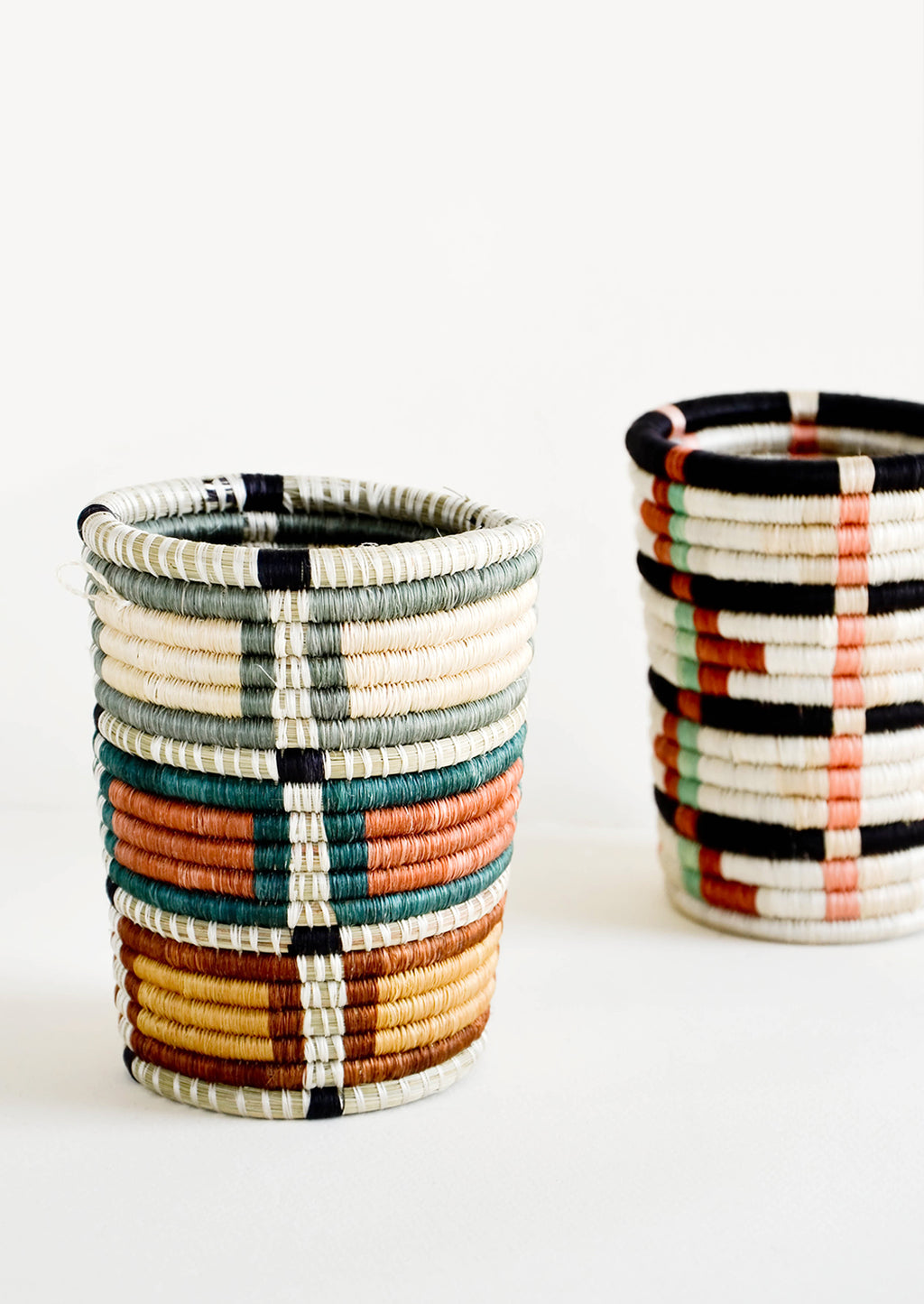3: Pencil cup shaped baskets woven from multicolor sweetgrass.
