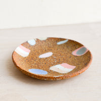 3: Ceramic trinket dish with various inlay shapes.