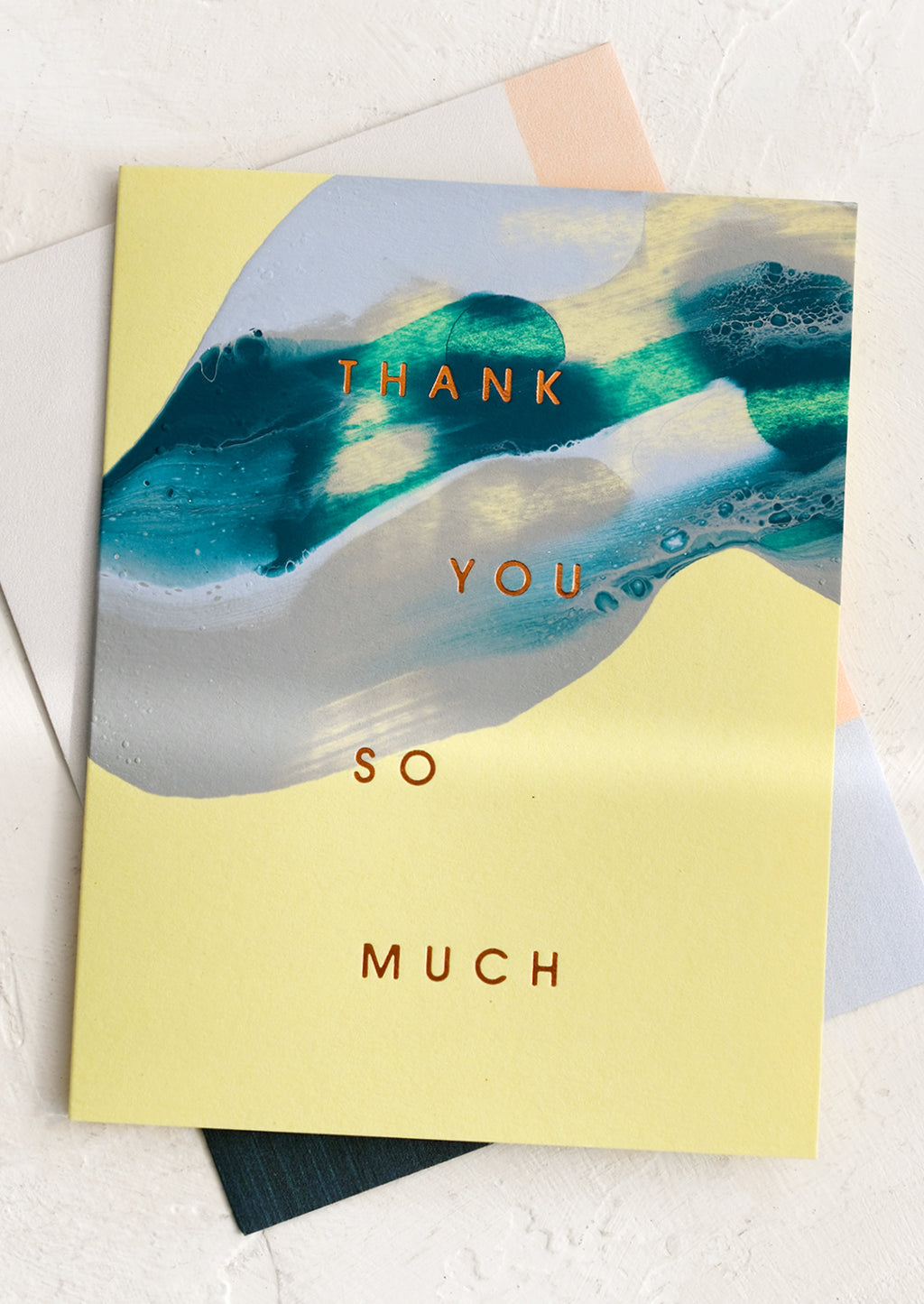 2: A set of lime green and blue swirl thank you cards.