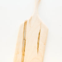 Medium: A short rectangular pale wood cutting board with handle.