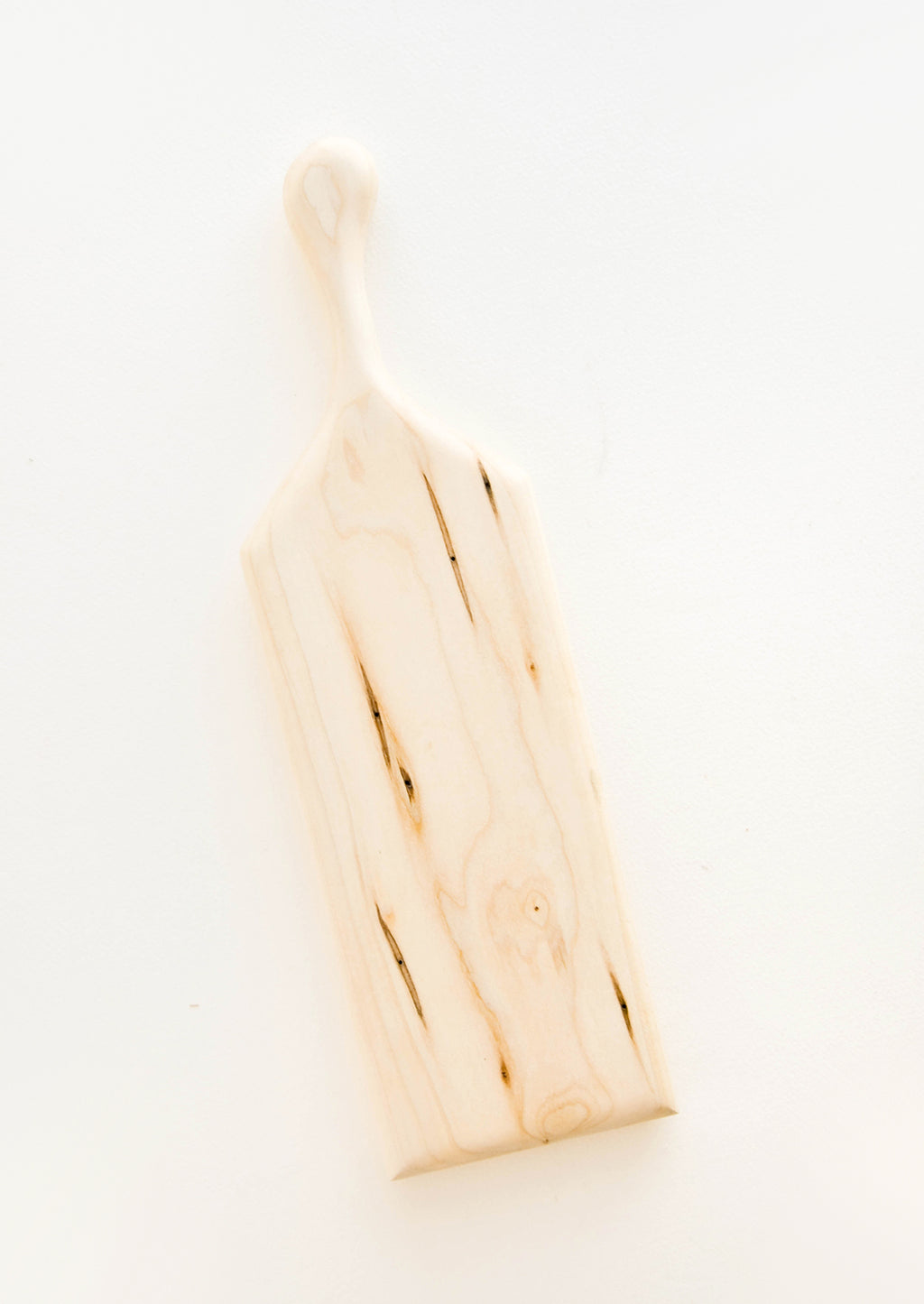 Small: A long rectangular pale wood cutting board with handle.