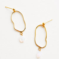 1: Gold imperfectly shaped oval earrings each with a small dangling opal gemstone.