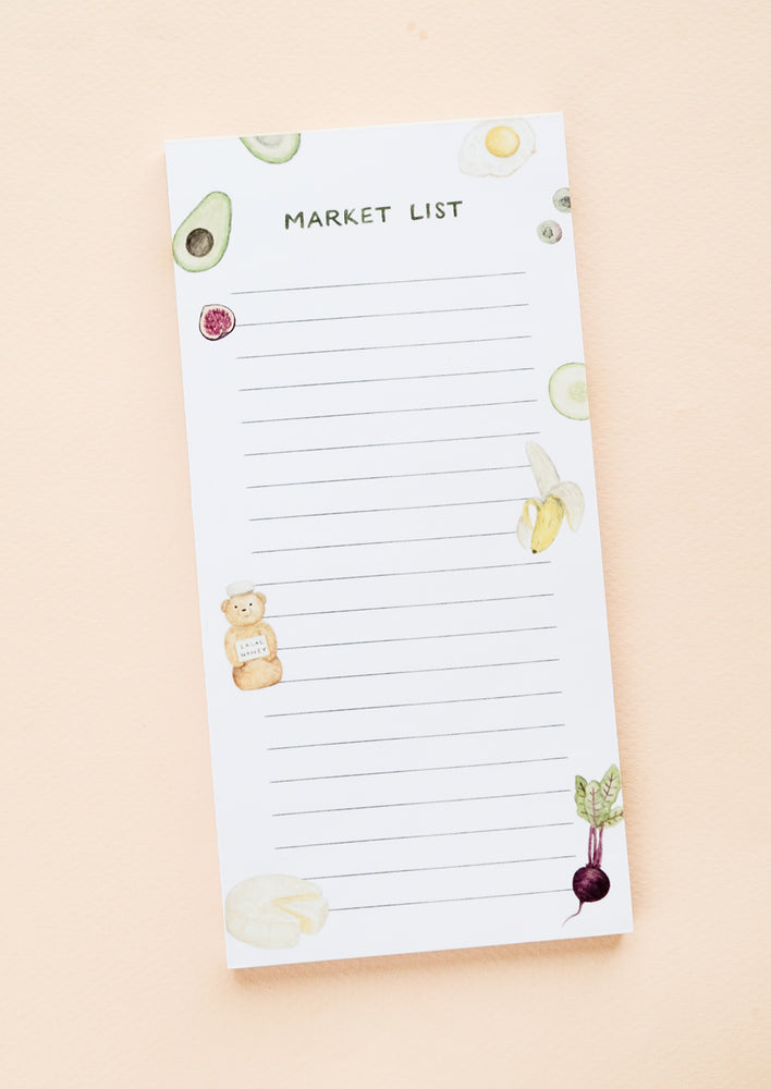 1: A printed notepad for making grocery lists, illustrated at sides with various food items.