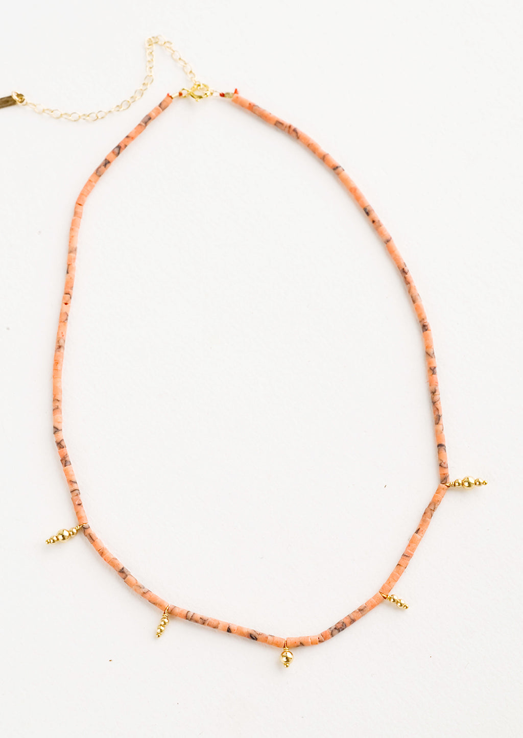 Peach: Beaded necklace with small peach and gold beads