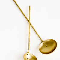 2: Metal ladles in small and large sizes, crafted in solid brass with skinny handles