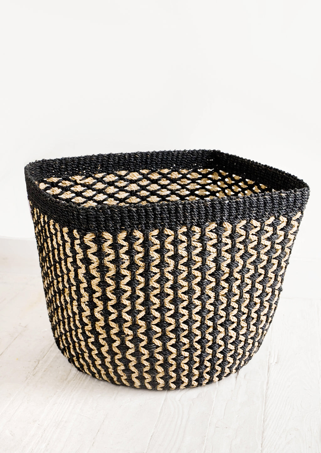 Large: Square storage basket in black with tan zigzag design and black top rim