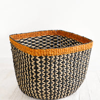 Medium: Square storage basket in black with tan zigzag design and orange top rim