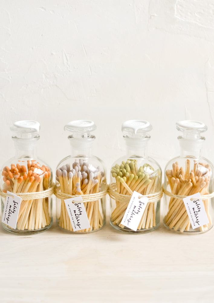 Safety matches in vintage style glass apothecary jars, with four match tip color options.