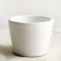 Matte White: A ceramic espresso cup in matte white.