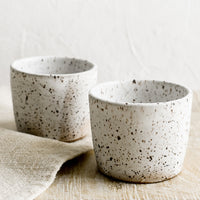 Speckled White: Two espresso cups in speckled white ceramic.