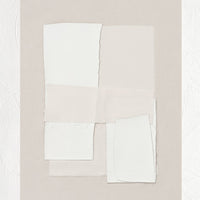 1: A beige art print with layered ivory textile.