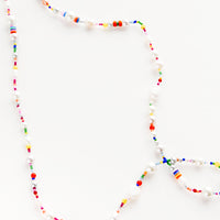 2: Long beaded necklace with a mix of pearl, glass and colorful plastic beads