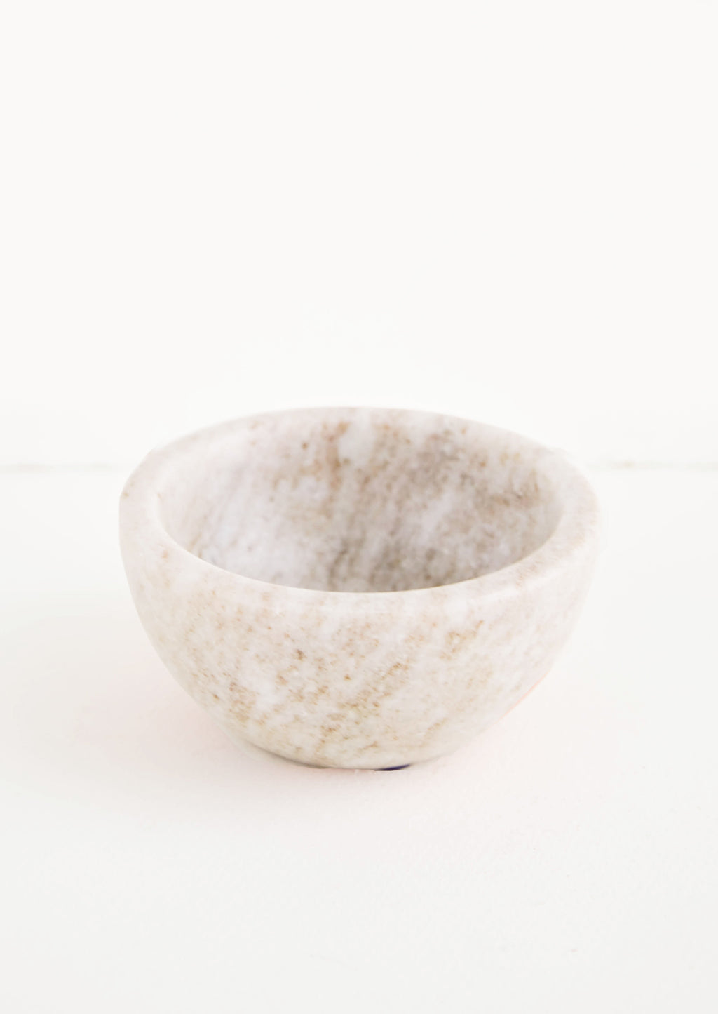 Tan: Small marble bowl made from solid grey/tan colored marble
