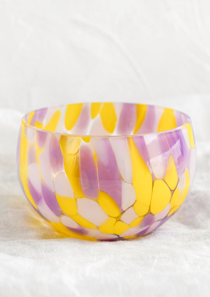 Purple / Yellow: A speckled glass candy bowl in purple and yellow.