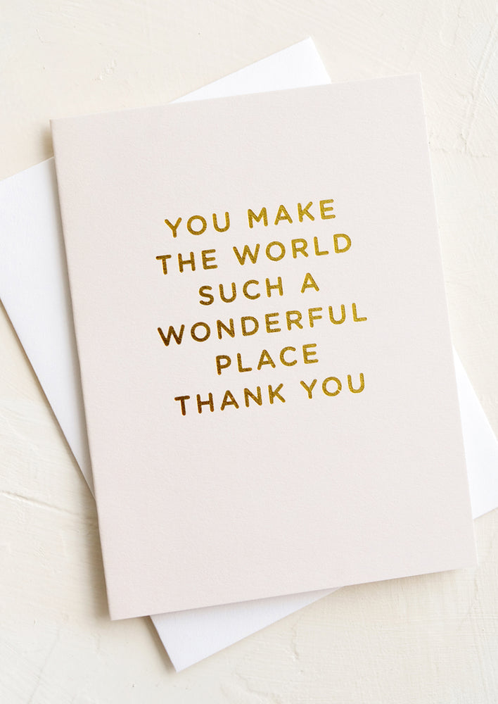 1: An ivory card with gold text reading "You make the world such a wonderful place thank you".