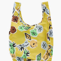 Paper Floral: A reusable nylon bag in yellow floral print.