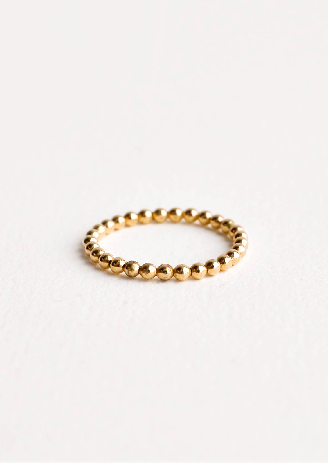 Yellow gold beaded ball ring.
