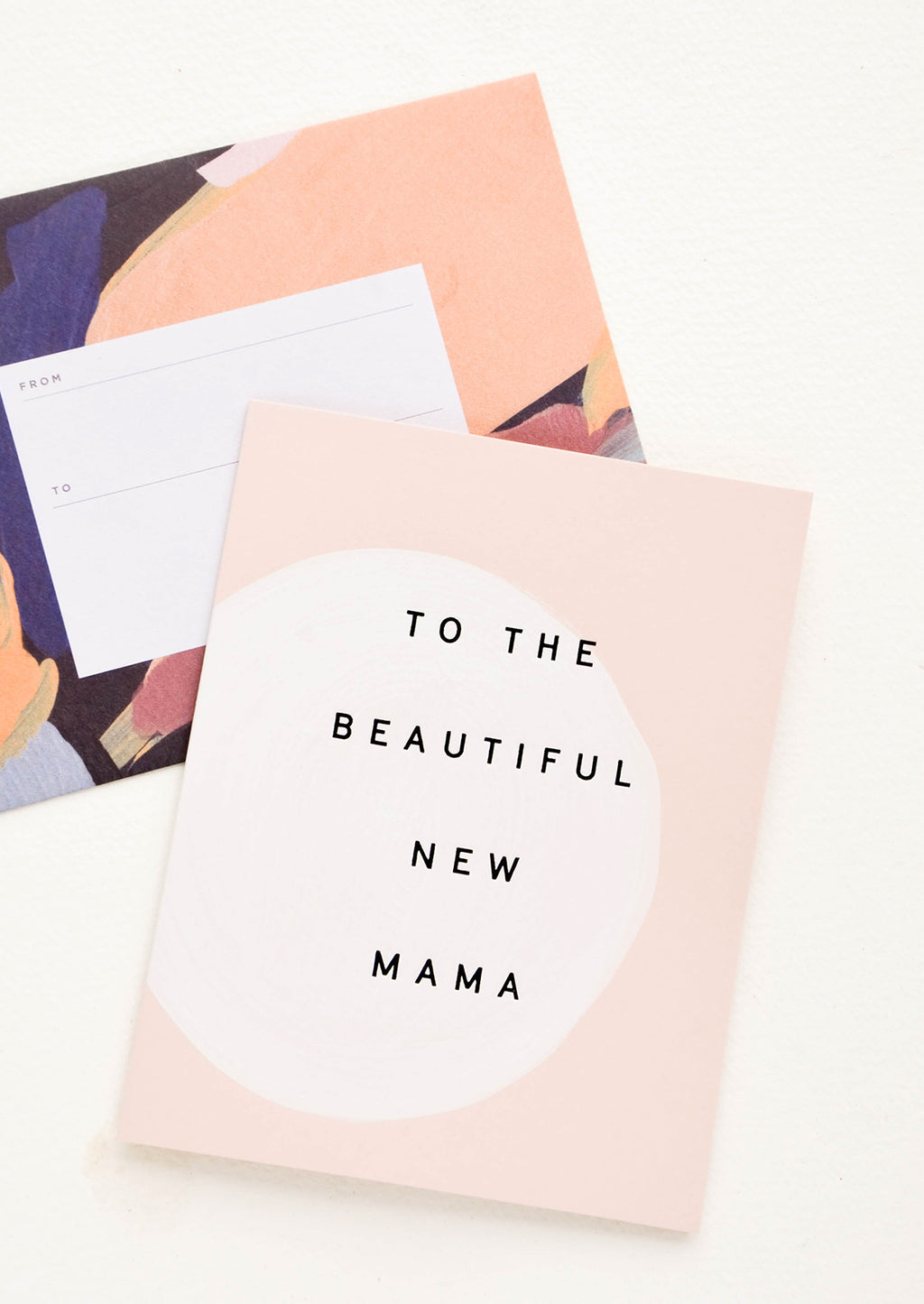 2: Greeting card with hand painted circle and black text reading "To The Beautiful New Mama", paired with abstract printed envelope