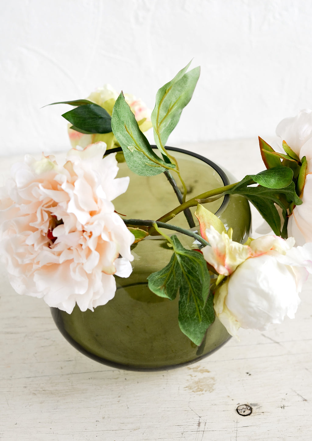 Olive / Small: An olive green glass vase with peony flowers.