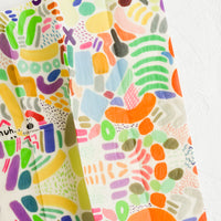 Single / Large: A beeswax wrap in abstract multicolor print.