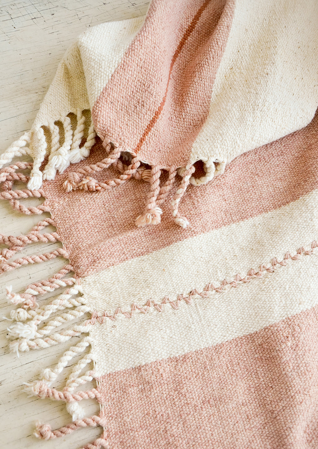 Natural / Blush: Natural woven cotton throw in blush and terracotta stripes with twisted fringe edge