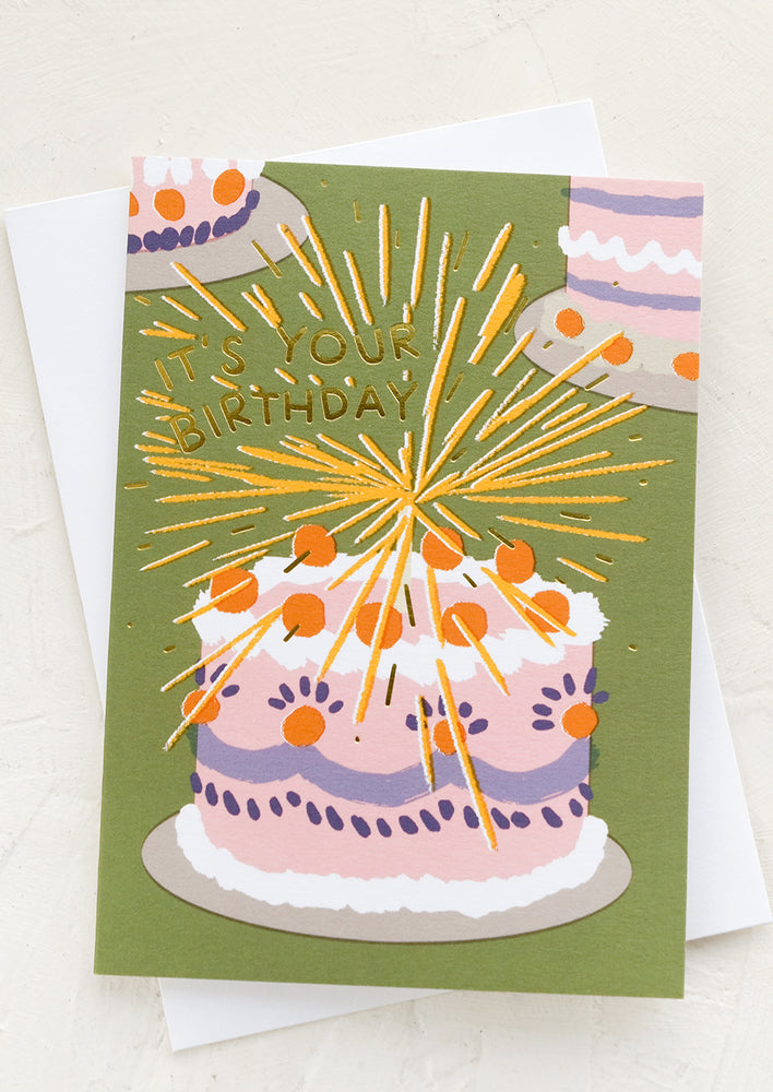 1: A birthday card with image of cake with candles.