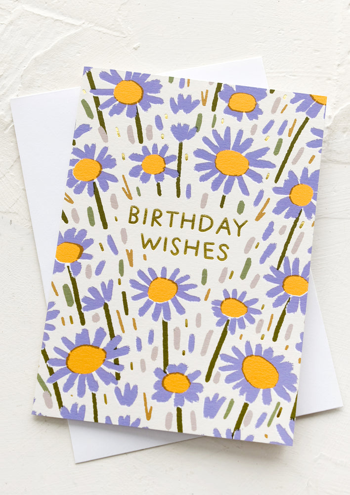 1: A card with purple flowers and text reading "Birthday Wishes".