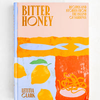 1: A colorful hardcover cookbook with graphic imagery.