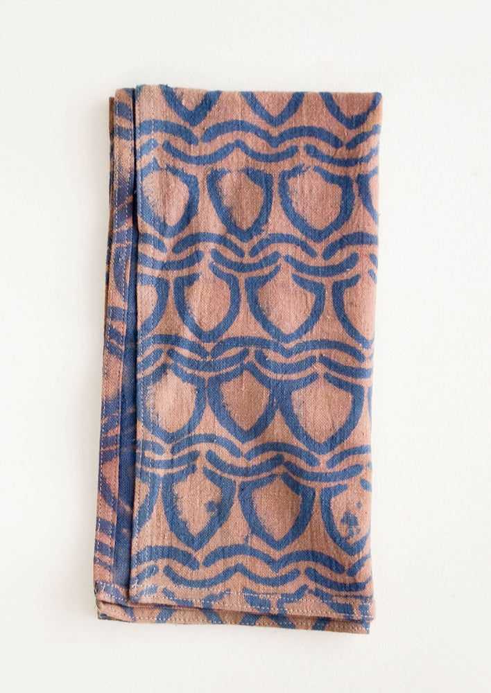 Block print cotton dinner napkin in rose pink with blue abstract pattern