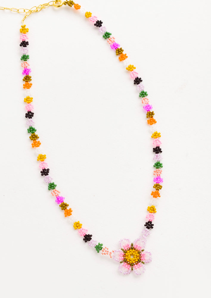 1: Beaded necklace with "chain" comprised of colorful beaded flowers, beaded flower pendant at front