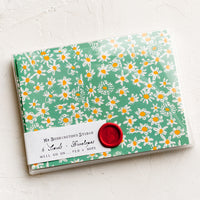 2: A set of green daisy print cards in box with decorative wax seal packaging.