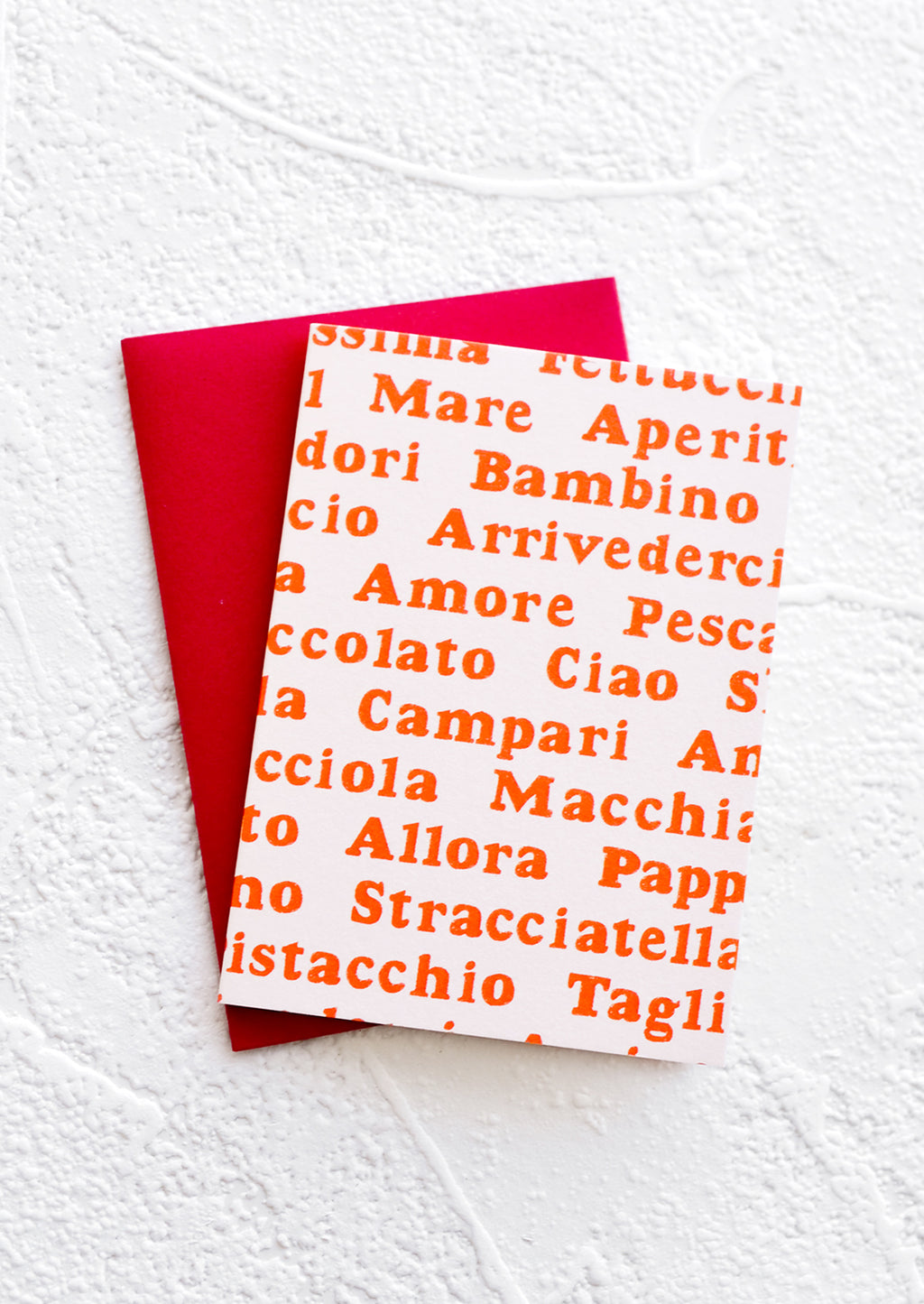 Parli Italiano?: A gift enclosure greeting card with a pale pink background and Italian words printed in red text.