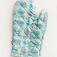 Cool Multi: An oven mitt with retro floral pattern in aqua and lavender.
