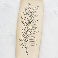 Sage: A long and skinny ceramic tray in natural bisque color with an etched black drawing of a Sage plant.