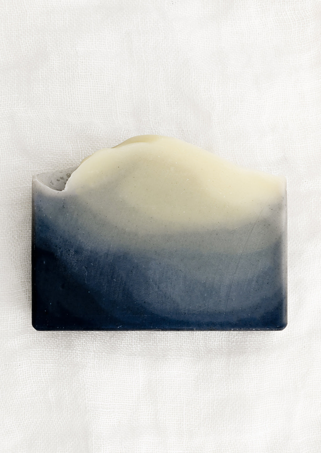 Indigo: A bar of soap in indigo style (layered charcoal pattern).