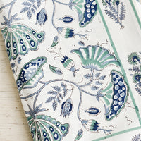 Navy Multi: A botanical block printed tablecloth in navy and teal.
