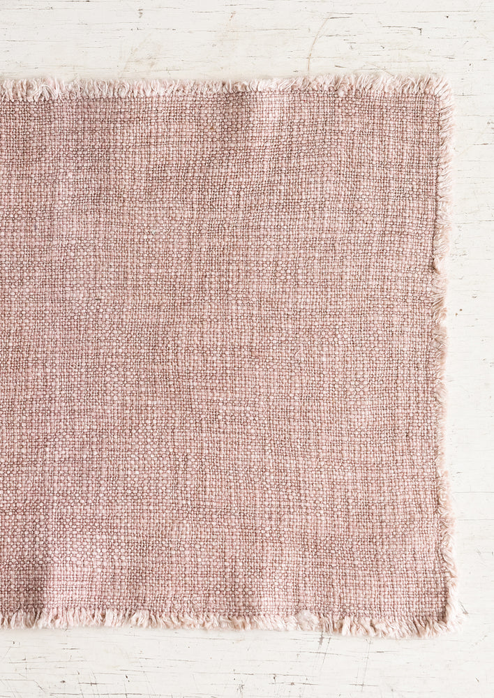 Dusty Rose: A slub boucle textured placemat in dusty rose.