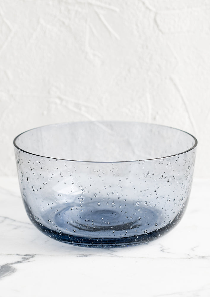 A glass bowl in twilight blue.