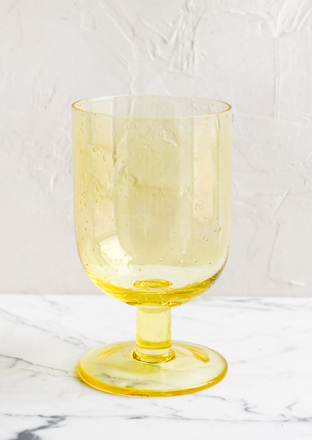 Lemon: A stemmed wine glass in yellow.