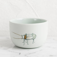 Small / Beetle / Mint: A short and wide mint porcelain cup with beetle sketch.