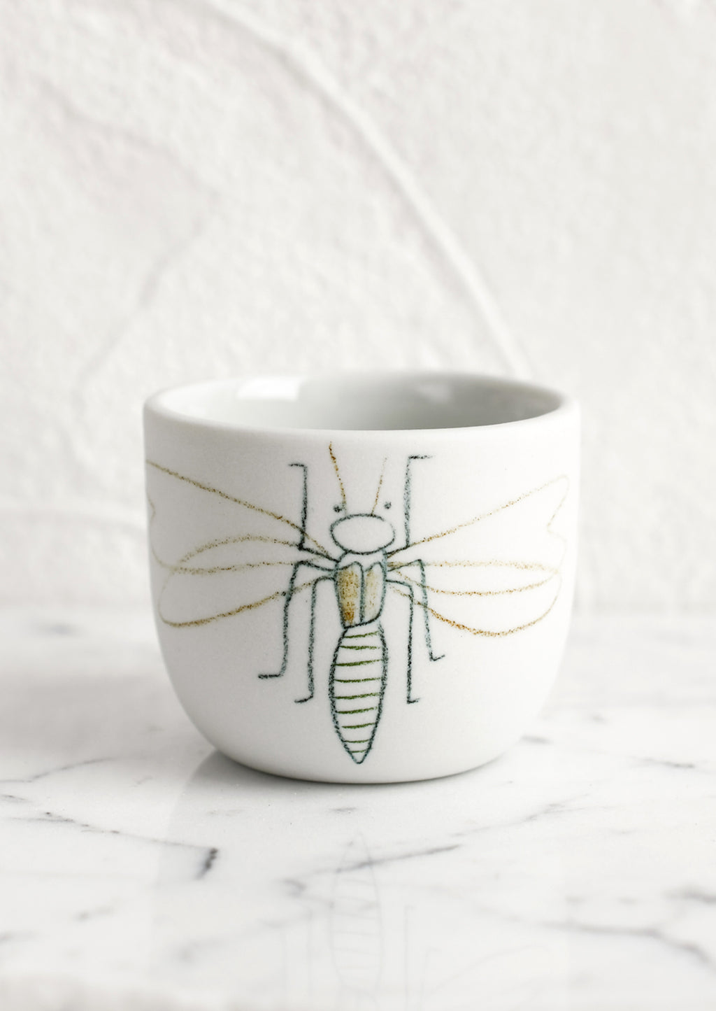 Extra Small / Firefly / White: An extra small grey porcelain cup with firefly sketch.