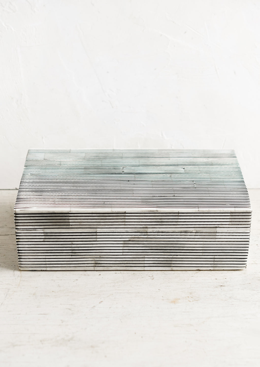Large: A large lidded storage box made from black & white striped bone.