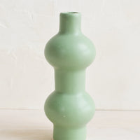 Double Sphere: A mint green ceramic bud vase in curvy double sphere silhouette.
