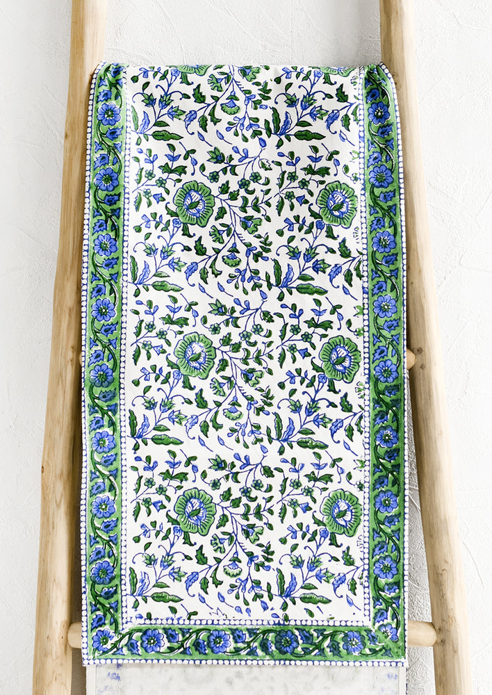 1: A table runner in blue and green floral block print.