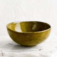 Ice Cream Bowl: A small ceramic bowl in mossy green glaze.