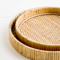 3: Nesting circular serving trays made from woven rattan